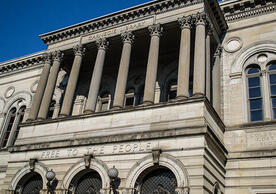 Picture of the front of the Carnegie Public Library in Pittsburgh with "Free to the People" over main entrance.